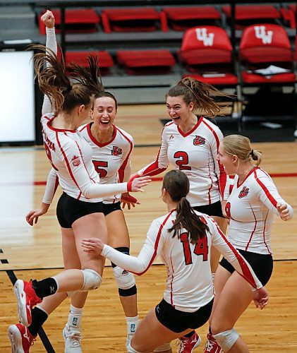 JOHN WOODS / WINNIPEG FREE PRESS
University of Winnipeg Wesmen celebrate a win against the  Fraser Valley Cascades in the third round of the Canada West quarter-final series Sunday, February 26, 2023. 

Re: sawatzky