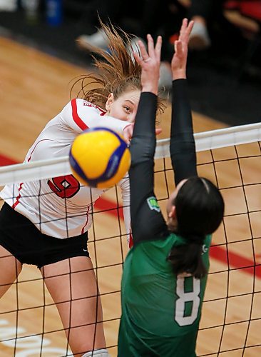 JOHN WOODS / WINNIPEG FREE PRESS
University of Winnipeg Wesmen&#x2019;s Emma Parker (9) goes up for the spike against Fraser Valley Cascades&#x2019; Gabrielle Attieh (8) in the third round of the Canada West quarter-final series Sunday, February 26, 2023. 

Re: sawatzky