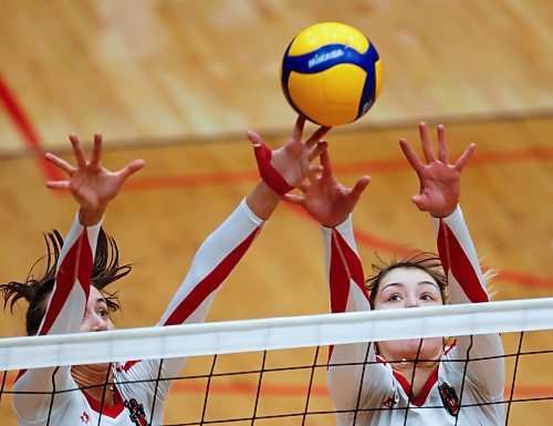JOHN WOODS / WINNIPEG FREE PRESS
University of Winnipeg Wesmen&#x573; Selva Planincic (5), left, and Haille Bujan (18) go up for the block against Fraser Valley Cascades in the third round of the Canada West quarter-final series Sunday, February 26, 2023. 

Re: sawatzky