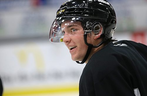 Brandon Wheat Kings defenceman Quinn Mantei smiles at a teammate during a practice earlier this season at Westoba Place in November. The second-year rearguard has been a model of consistency for the club. (Perry Bergson/The Brandon Sun)