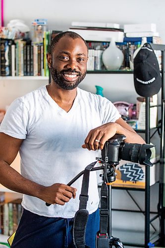 MIKAELA MACKENZIE / WINNIPEG FREE PRESS

Nigerian-Canadian filmmaker Bisong Taiwo, who recently released Mary&#x573; Way of the Cross, poses for a photo in his home in Winnipeg on Tuesday, Feb. 21, 2023. The hour-long film features a black Mary and showcases the interiors and religious artwork of 13 Catholic parishes across the province. For Brenda story.

Winnipeg Free Press 2023.