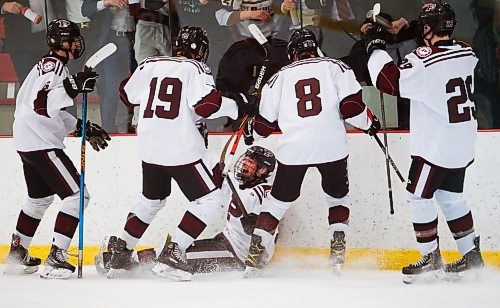 JOHN WOODS / WINNIPEG FREE PRESS
St. Paul&#x2019;s Crusaders&#x2019; Riley Patterson (9), centre, celebrates his goal  against the Garden City Gophers in the second period of game one of the Winnipeg High School Hockey League playoffs Monday, February 27, 2023. 

Reporter: ?