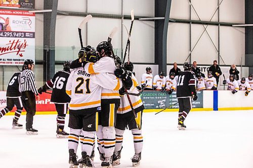 MIKAELA MACKENZIE / WINNIPEG FREE PRESS

Garden City High School celebrates a goal agains St. Paul&#x2019;s High School during a hockey game at Seven Oaks Complex in Winnipeg on Wednesday, March 1, 2023. For Josh story.

Winnipeg Free Press 2023.