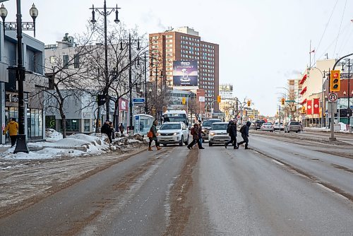 MIKE DEAL / WINNIPEG FREE PRESS
Portage Avenue looking west on a clear day, March 1st, 2023. Shot for the Then and Now feature.
230301 - Wednesday, March 01, 2023.