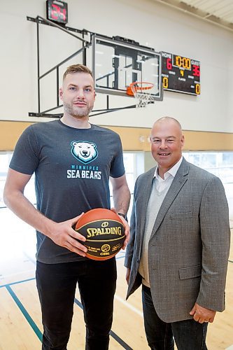 MIKE DEAL / WINNIPEG FREE PRESS
Winnipeg Sea Bears head coach, Mike Taylor, with Winnipeg product Chad Posthumus the first player signed by the Winnipeg Sea Bears pro basketball team.
230301 - Wednesday, March 01, 2023.