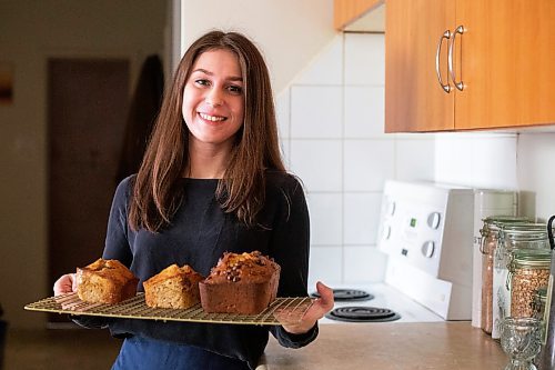 MIKAELA MACKENZIE / WINNIPEG FREE PRESS

Cassandra Hoefer, owner of Bread Habits, poses for a photo with some of her famous banana bread in her home in Winnipeg on Wednesday, March 1, 2023. For Dave Sanderson Piche story.

Winnipeg Free Press 2023.