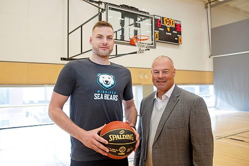 MIKE DEAL / WINNIPEG FREE PRESS
Winnipeg Sea Bears head coach, Mike Taylor, with Winnipeg product Chad Posthumus the first player signed by the Winnipeg Sea Bears pro basketball team.
230301 - Wednesday, March 01, 2023.