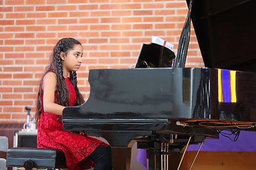 Mithika Maiti showcases her talent as a pianist by performing Mark Mrozinski's "Turkish Bazaar" at Knox United Church. Maiti was second to perform in the Brandon Festival of the Arts' "Junior and Intermediate Piano" showcase that took place on Thursday afternoon. (Kyle Darbyson/The Brandon Sun) 