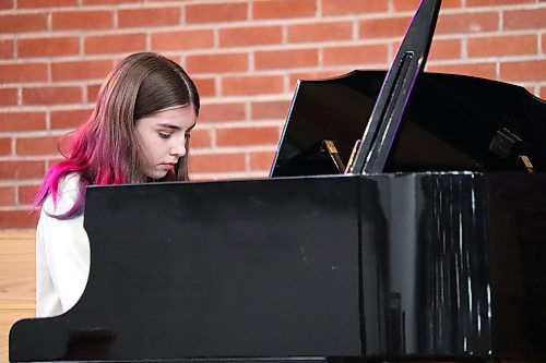 Eleanore Wilts is in deep concentration as she performs Howard Kasschau's "Spooks Galore" for the Brandon Festival of the Arts' "Junior and Intermediate Piano" showcase, which began on Thursday and continues today at Knox United Church. (Kyle Darbyson/The Brandon Sun)
