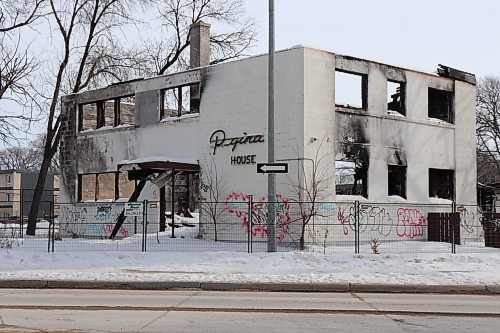 Tyler Searle / Winnipeg Free Press

The remains of a vacant apartment at 160 Mayfair Ave. on March 1, 2023. The building burned May 28, 2022, and has been sitting untouched since. The property owner says he wants to tear it down but does not have plans in place to rebuild and wait lists for demolition companies are months long. 