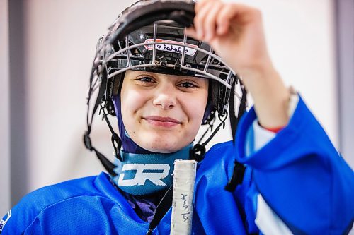 MIKAELA MACKENZIE / WINNIPEG FREE PRESS

Rahaf Abdul Karim, 13, poses for a photo after her hockey game at the Allard Arena in Winnipeg on Wednesday, March 1, 2023. She arrived in Winnipeg as a Syrian refugee together with her parents around five years ago. For AV Kitching story.

Winnipeg Free Press 2023.