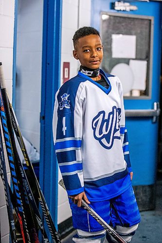 MIKAELA MACKENZIE / WINNIPEG FREE PRESS

Mikli Gemechu, center on the U13 WJHA hockey team, poses for a photo before a game at the Osborne Recreation Centre in Winnipeg on Wednesday, March 1, 2023. He was born in Winnipeg, two years after his family arrived in Canada from Ethiopia, and learned to play hockey thanks to the folks at Winnipeg Newcomer Sport Academy. 
For AV Kitching story.

Winnipeg Free Press 2023.