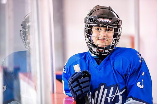 MIKAELA MACKENZIE / WINNIPEG FREE PRESS

Rahaf Abdul Karim, 13, poses for a photo after her hockey game at the Allard Arena in Winnipeg on Wednesday, March 1, 2023. She arrived in Winnipeg as a Syrian refugee together with her parents around five years ago. For AV Kitching story.

Winnipeg Free Press 2023.