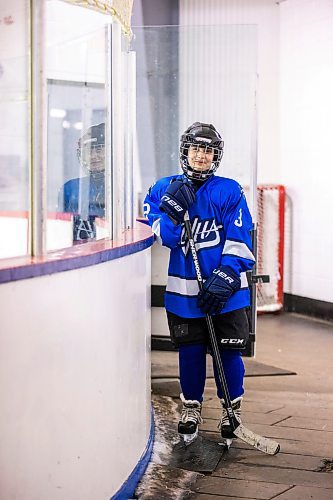 MIKAELA MACKENZIE / WINNIPEG FREE PRESS

Rahaf Abdul Karim, 13, poses for a photo after her hockey game at the Allard Arena in Winnipeg on Wednesday, March 1, 2023. She arrived in Winnipeg as a Syrian refugee together with her parents around five years ago. For AV Kitching story.

Winnipeg Free Press 2023.