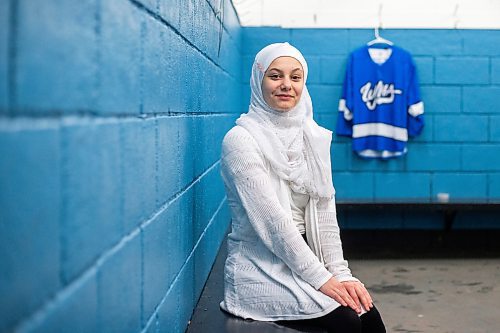 MIKAELA MACKENZIE / WINNIPEG FREE PRESS

Rahaf Abdul Karim, 13, poses for a photo after her hockey game at the Allard Arena in Winnipeg on Wednesday, March 1, 2023. She arrived in Winnipeg as a Syrian refugee together with her parents around five years ago. For AV Kitching story.

Winnipeg Free Press 2023.