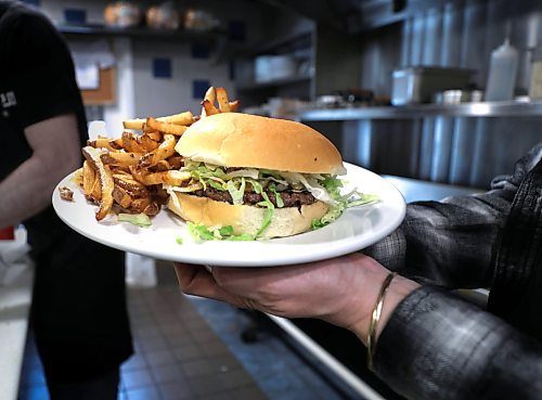 RUTH BONNEVILLE / WINNIPEG FREE PRESS 

INTERSECTION - fatboys

Photos of chef, Richard Caron, as he taste tests a Fat Boy at George's Burgers, 1141 St. Mary's Rd. 

What: This is for an Intersection piece on Richard's Instagram account, For the Love of All Fat Boys, an ode to Winnipeg's favourite burger. For a few years now, Richard has been going from place to place, inside and outside of the city, in search of the perfect fat boy. He chronicles his findings on his Instagram account 

See Dave's story.

March 2nd,  2023