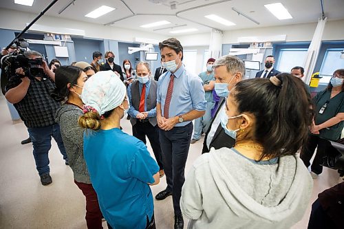 MIKE DEAL / WINNIPEG FREE PRESS
Prime Minister, Justin Trudeau, along with Kevin Lamoureux (left), MP for Winnipeg North, and Terry Duguid (right), MP for Winnipeg South, visit health care workers at the Grace Hospital Friday afternoon.
230303 - Friday, March 03, 2023.