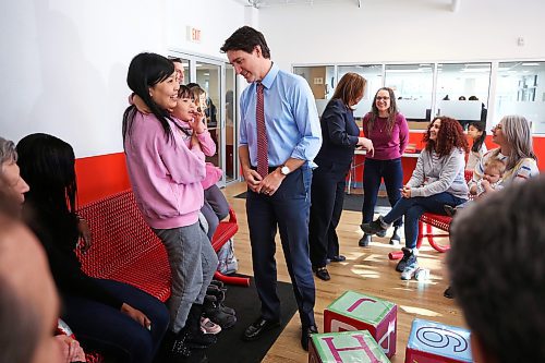 MIKE DEAL / WINNIPEG FREE PRESS
Prime Minister Justin Trudeau chats with mother Yang Li and her daughter Ivy, 4, prior to making the announcement at the YMCA on Fermor Friday morning. 
Prime Minister, Justin Trudeau, and the Premier of Manitoba, Heather Stefanson, today announced that Manitoba will achieve an average of $10-a-day regulated child care on April 2, 2023 &#x2013; three years ahead of the national target.
230303 - Friday, March 3, 2023