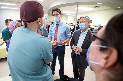 MIKE DEAL / WINNIPEG FREE PRESS
Prime Minister, Justin Trudeau, along with Kevin Lamoureux (left), MP for Winnipeg North, and Terry Duguid (right), MP for Winnipeg South, visit health care workers at the Grace Hospital Friday afternoon.
230303 - Friday, March 03, 2023.