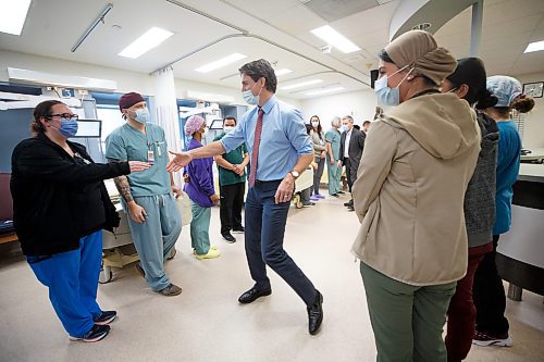MIKE DEAL / WINNIPEG FREE PRESS
Prime Minister, Justin Trudeau, along with Kevin Lamoureux, MP for Winnipeg North, and Terry Duguid, MP for Winnipeg South, visit health care workers at the Grace Hospital Friday afternoon.
230303 - Friday, March 03, 2023.