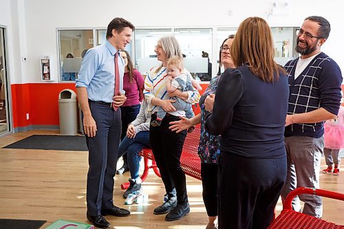 MIKE DEAL / WINNIPEG FREE PRESS
Prime Minister, Justin Trudeau, chats with Therea Young Kuzina and her infant at the YMCA on Fermor Friday morning.
Prime Minister, Justin Trudeau, and the Premier of Manitoba, Heather Stefanson, today announced that Manitoba will achieve an average of $10-a-day regulated child care on April 2, 2023 &#x2013; three years ahead of the national target.
230303 - Friday, March 03, 2023.