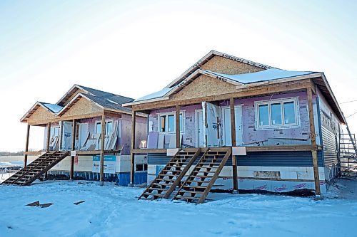 03032023
Two duplexes under construction by Habitat for Humanity in the 700 block of Franklin Street in Brandon on Friday.
(Tim Smith/The Brandon Sun)