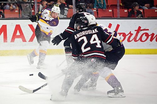 03032023
Calder Anderson #14 of the Brandon Wheat Kings fires a shot on net during WHL action agasinst the Red Deer Rebels at Westoba Place on Friday evening. 
(Tim Smith/The Brandon Sun)