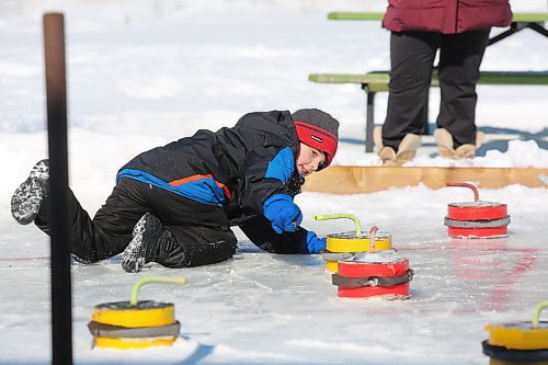 Six-year-old Nathan Dubnick tries his hand at crokicurl during the city's Winter Fest celebration, which took place in and around Brandon's Community Sportsplex on Saturday afternoon. This year's Winter Fest attractions included horse-drawn sleigh rides, live music, free food and a story trail hike on Hanbury Hill. (Kyle Darbyson/The Brandon Sun)