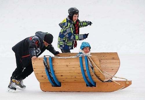 JOHN WOODS / WINNIPEG FREE PRESS
Gavin and Etta Morrisseau with their cousin Ondray Dubuc-McDonald, left, enjoy a sleigh ride and skating at the Forks Sunday, March 5, 2023. 

Re: piche