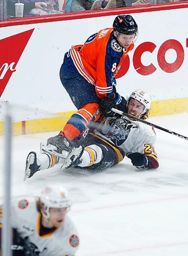 JOHN WOODS / WINNIPEG FREE PRESS
Manitoba Moose Nicholas Jones (8) checks Chicago Wolves&#x2019; Nathan Sucese (25) during second period AHL action in Winnipeg on Sunday, March 5, 2023.

Reporter: ?