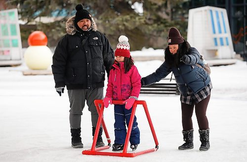 JOHN WOODS / WINNIPEG FREE PRESS
Jeff and Jill Aquino help their daughter Nina practice her skating at the Forks Sunday, March 5, 2023. 

Re: piche