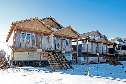 Two duplexes under construction by Habitat for Humanity in the 700 block of Franklin Street in Brandon on March 3. (Tim Smith/The Brandon Sun)