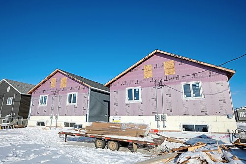 Two duplexes under construction by Habitat for Humanity in the 700 block of Franklin Street in Brandon on March 3. (Tim Smith/The Brandon Sun)