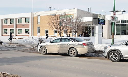 RUTH BONNEVILLE / WINNIPEG FREE PRESS 

Local - Garden City Collegiate 

A police cruiser belonging to a community resource officer is parked out front of Garden City Collegiate after the school was in lockdown for reasons unknown on Tuesday. 

March 7th,,  2023