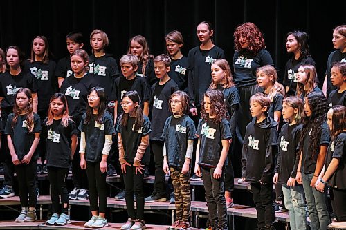 The École Harrison Chorale Avancée, grades 5-6 choir, performs during the School Chorus, Own Choice, grades 4-6 category of the School and Community Music portion of the Brandon Festival of the Arts at the Western Manitoba Centennial Auditorium on Tuesday. (Tim Smith/The Brandon Sun)
