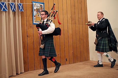 Brandon Sun 21012017

Evan Dyson pipes in the haggis, carried by Brent Lowrie  during the Westman Scottish Association's annual Robbie Burns Dinner on Saturday evening at Sokol Hall. The famous Scottish poet was born on January 25th and his life and work are celebrated in Scotland and by Scottish expats the world over. (Tim Smith/The Brandon Sun)