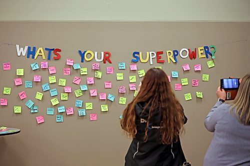 08032022
Women take photos of the What&#x2019;s Your Superpower sticky-note board at the Brandon Chamber of Commerce Superwoman Conference 4.0 conference at the Keystone Centre on Wednesday. 
(Tim Smith/The Brandon Sun)