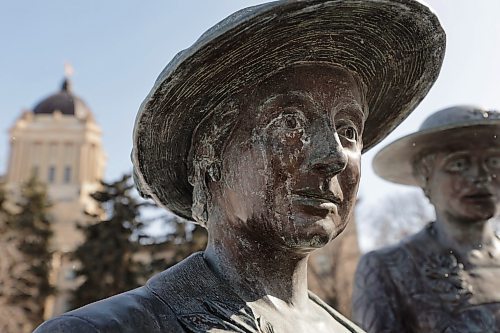 RUTH BONNEVILLE / WINNIPEG FREE PRESS 

Local - Statues of the Famous Five

Photo of Emily Murphy of the Famous 5 Monument on the grounds of the Manitoba Legislative Building in honour of their past achievements on International Women&#x573; Day.

Info:
The Nellie McClung Foundation was created in order to acknowledge and raise awareness of the contributions of Nellie McClung and her famous friends. These were important Canadians who assisted in advancing the cause of women in this province and country, and who created opportunities for all citizens for generations to come.

The &#x506;amous Five, Right to Left
1. Nellie McClung   2. Louise McKinney   3. Irene Parlby 4. Emily Murphy     5. Henrietta Muir Edwards


March 8th,,  2023
