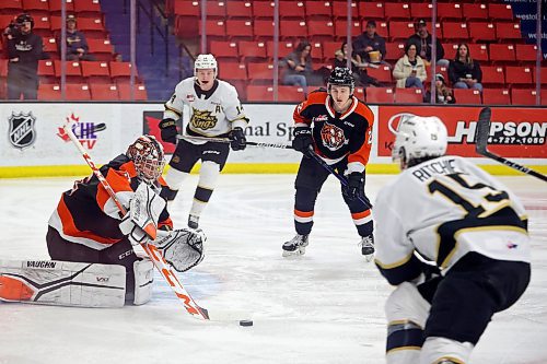 08032022
Netminder Beckett Langkow #35 of the Medicine Hat Tigers deflects a shot on net during WHL action against the Brandon Wheat Kings at Westoba Place on Wednesday evening. 
(Tim Smith/The Brandon Sun)