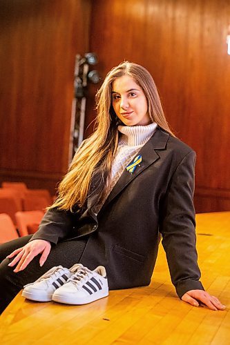 MIKAELA MACKENZIE / WINNIPEG FREE PRESS

The Shoe Project performer Yuliia Kovalenko poses for a photo with the shoes she&#x573; chosen at the Manitoba Museum auditorium  in Winnipeg on Friday, March 3, 2023. For &#x460;story.

Winnipeg Free Press 2023.