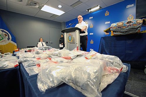Winnipeg Police Service Insp. Elton Hall speaks to reporters about large heroin and opium smuggling busts that resulted from a joint investigation with the Canada Border Services Agency on March 9. ERIK PINDERA/WINNIPEG FREE PRESS