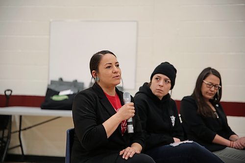 Lisa Noctor, co-chair of the Manitoba Sexual Exploitation & Trafficking Awareness Conference addresses the crowd of more than 100, at Assiniboine Community College on Friday. Darian Pont with GAP, from left, and Janis Irvine, coordinator of Community Mobilization Westman listen in. (Michele McDougall/The Brandon Sun)
