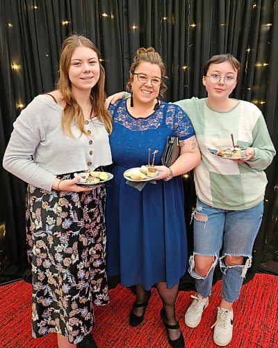 (Left to right) Evie Mannall, Shannon Saltarelli (winner of the Community Leadership &amp; Social Action Award Nominees), and Piper Mannall, during the 2023 Women of Distinction Awards at the Western Manitoba Centennial Auditorium on Thursday. (Mariah Phillips, for The Brandon Sun)