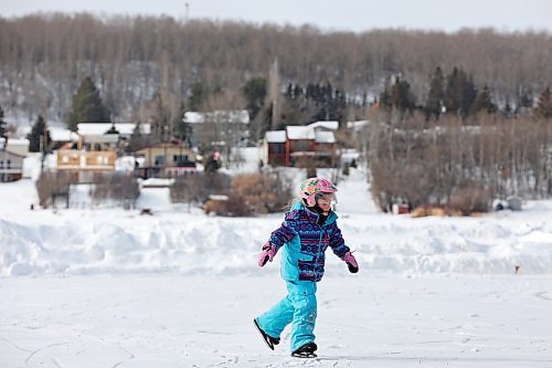 Five-year-old Claire Dagg ice skates on Minnedosa Lake with her grandfather Tom Instance (not shown) on a mild Friday. (Tim Smith/The Brandon Sun)