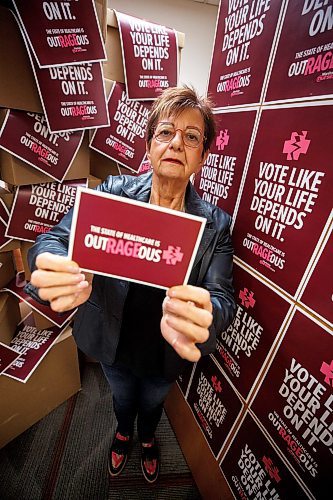 MIKE DEAL / WINNIPEG FREE PRESS
Darlene Jackson, MNU president, with posters and postcards for the campaign they are launching during the run up to the fall election to let people know what has been happening to health care.
230310 - Friday, March 10, 2023.