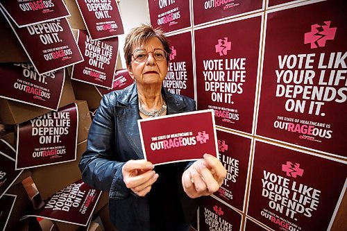 MIKE DEAL / WINNIPEG FREE PRESS
Darlene Jackson, MNU president, with posters and postcards for the campaign they are launching during the run up to the fall election to let people know what has been happening to health care.
230310 - Friday, March 10, 2023.