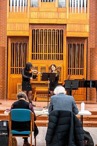 MIKAELA MACKENZIE / WINNIPEG FREE PRESS

Violinists Mini Jang (left) and Eun Shin Lee play in the Winnipeg Music Festival at Young United Church in Winnipeg on Friday, March 10, 2023. For &#x460;story.

Winnipeg Free Press 2023.