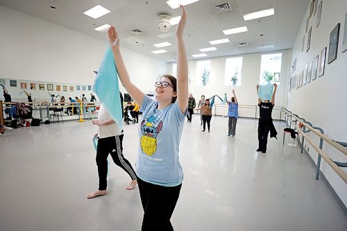 RUTH BONNEVILLE / WINNIPEG FREE PRESS 

ENT - RWB ExplorAbility

Javan swirls around a scarf  creating interesting moves while dancing  in RWB's  ExplorAbility Class on Wednesday. 

Subject:  ExplorAbility class at the RWB. This program aims to make dance more accessible with classes tailored to those diagnosed with Parkinson&#x573; and neurodiverse adults. Will be dropping in on the latter class today to observe and interview students and Jacqui Ladwig, the instructor/co-ordinator.  

See story by Eva Wasney


March 10th, 2023
