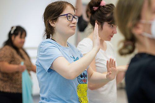 RUTH BONNEVILLE / WINNIPEG FREE PRESS
ENT - RWB ExplorAbility
Javan smiles as she moves her arms in RWB's ExplorAbility Class on Wednesday.
Subject: ExplorAbility class at the RWB. This program aims to make dance more accessible with classes tailored to those diagnosed with Parkinsonճ and neurodiverse adults. Will be dropping in on the latter class today to observe and interview students and Jacqui Ladwig, the instructor/co-ordinator.
See story by Eva Wasney
March 10th, 2023