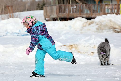 10032023
Five-year-old Claire Dagg ice skates on Minnedosa Lake with her grandfather Tom Instance on a mild Friday. (Tim Smith/The Brandon Sun)